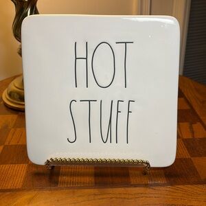 Rae Dunn trivet with Hot Stuff imprinted